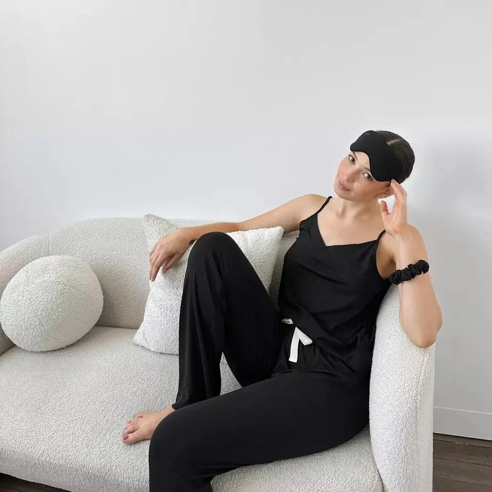Our sleepwear is designed with comfort in mind ☁️

Ella wears our Goodnight Sleep Cami, Sleep Pant and matching Eye Mask & Scrunchie in Black 🖤
