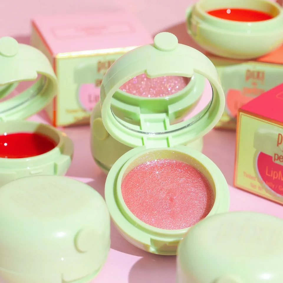 Lip-Loving Sweetness in Every Swipe 💖✨

Meet Sucre, our enchanting, silk-glazed LipMask that leaves lips feeling soft, plush and beautifully comforted in an instant. Infused with Camellia Oil, Jojoba and Pomegranate Extract, it hydrates, nourishes and adds a light-reflective cotton-candy pink tint while cocooning lips in cushiony care.

✨ A kiss of colour and care in one LipMask
✨ Luscious, glossy-finish balm texture
✨ Wear solo or layer for added nourishment

One swipe and watch the Glowing magic bloom. 💋

#PixiBeauty #LipMask #LipCareRoutine #JellyLipMask #GlowingLips
