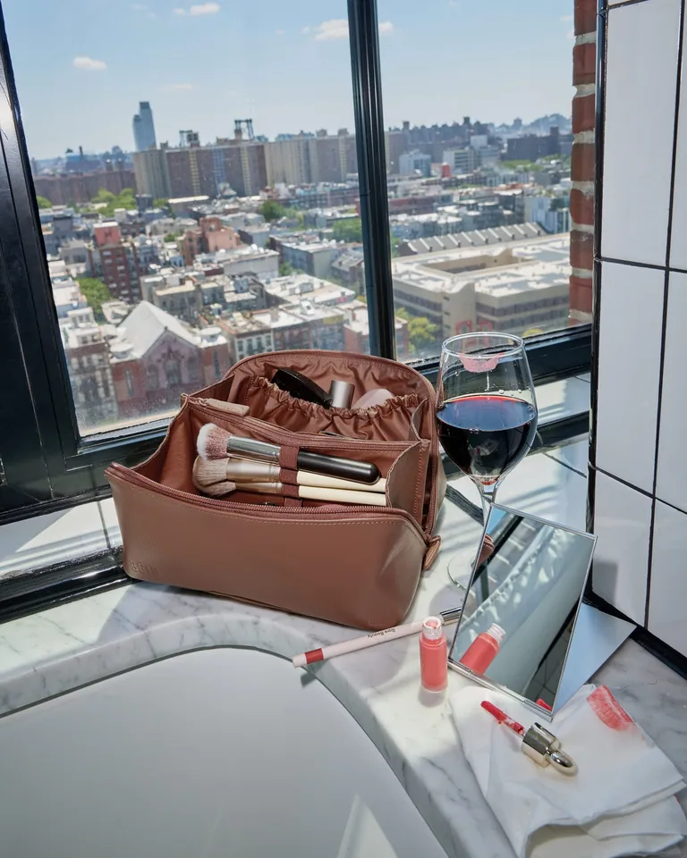The Small Carry-On Roller in Beige